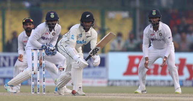 Debutant Ravindra deny India's win in nail-biter