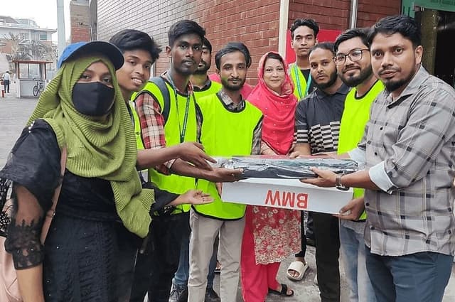 BCB gifts umbrellas as students take on traffic duties after PM's resignation