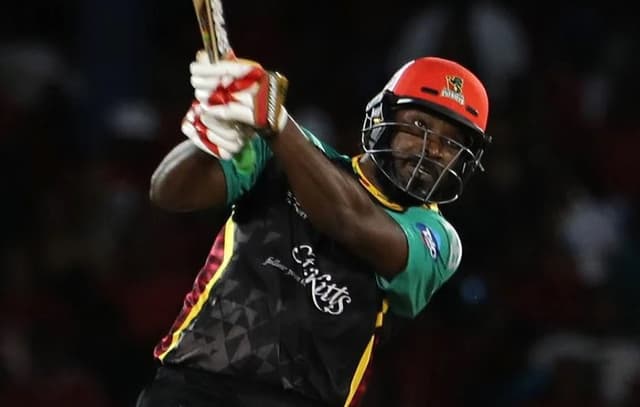 Watch: Gayle launches a powerful six and shatters the glass off Holder